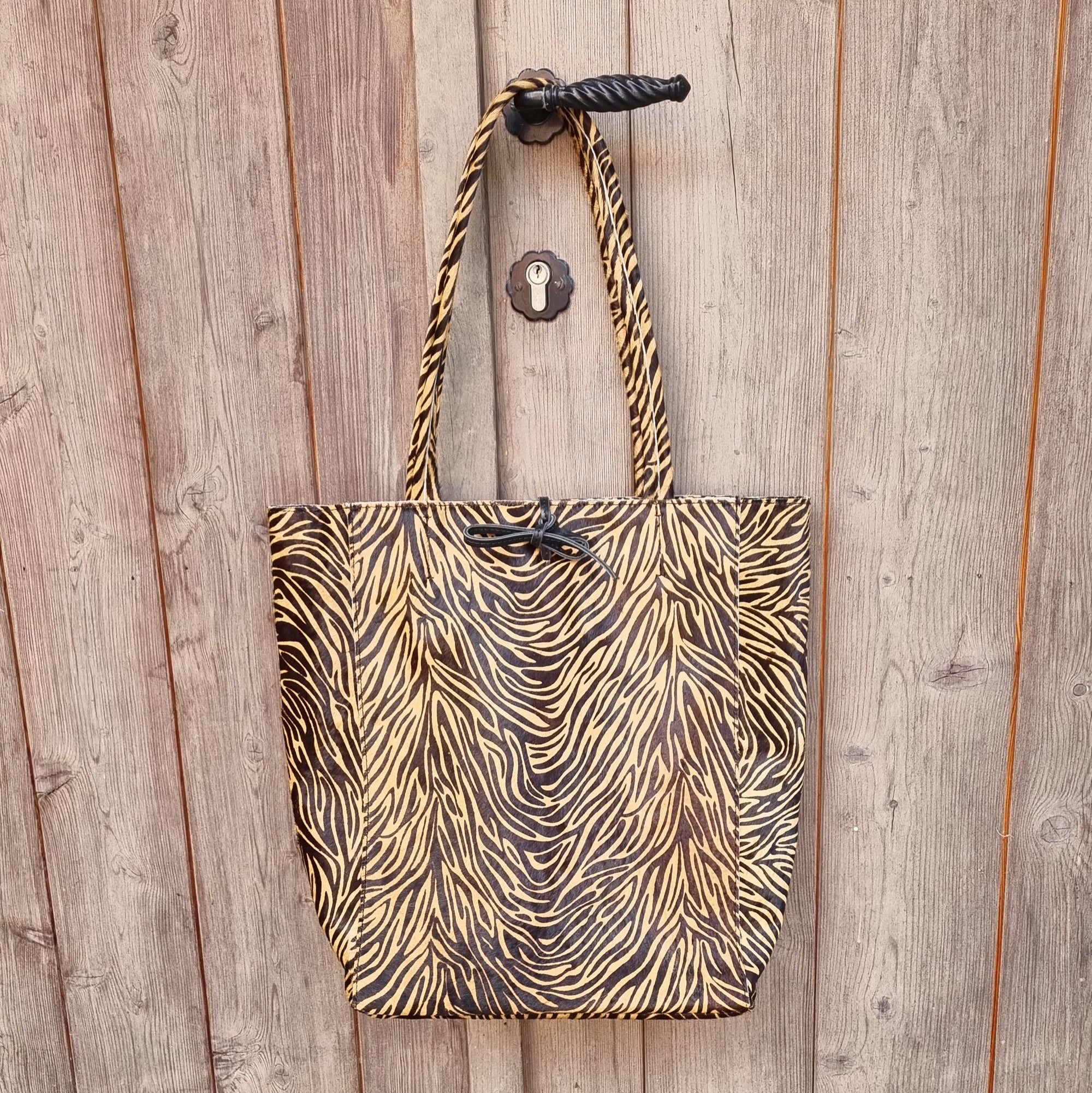 Yasmin zebra camel bag