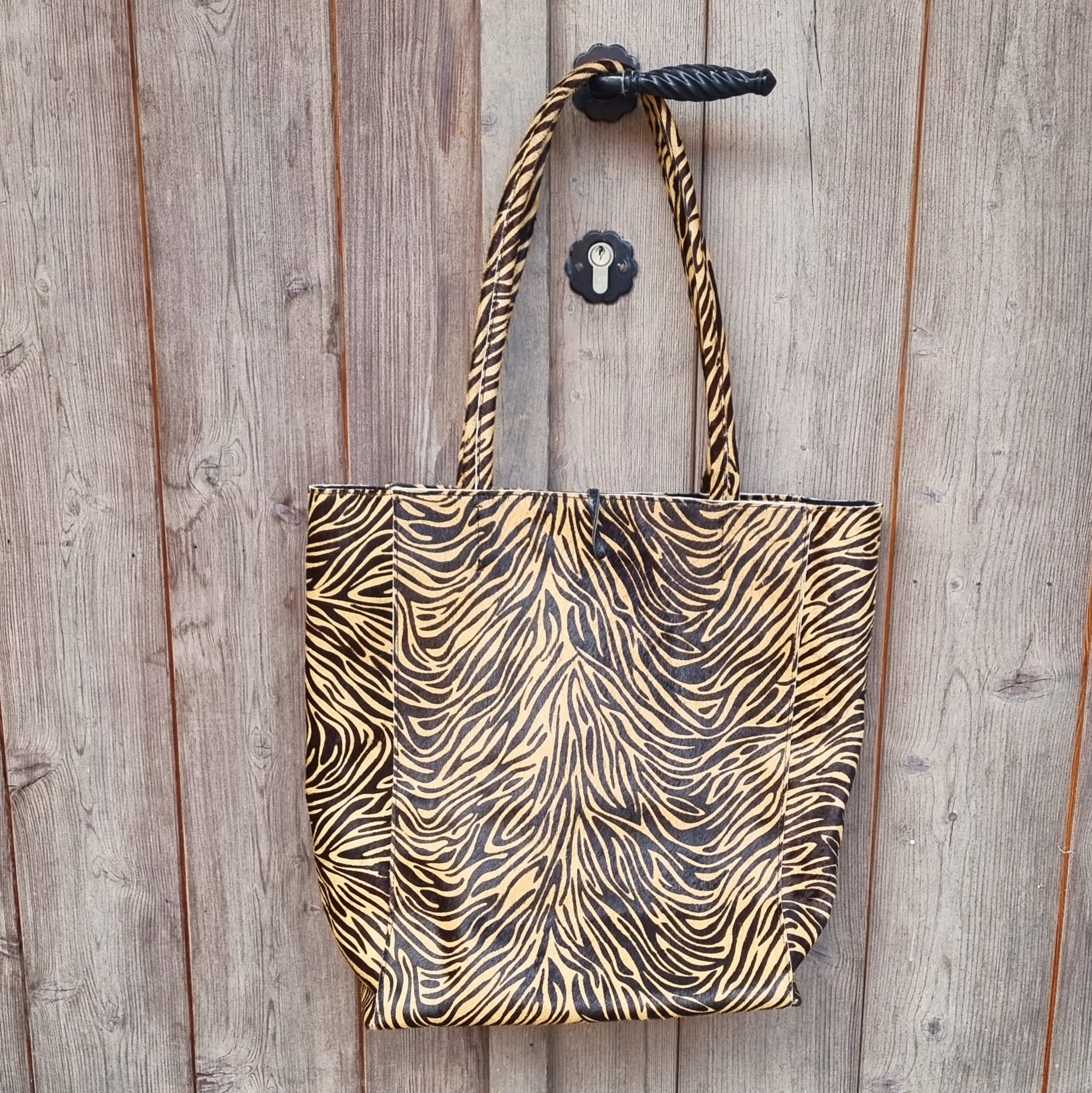 Yasmin zebra camel bag