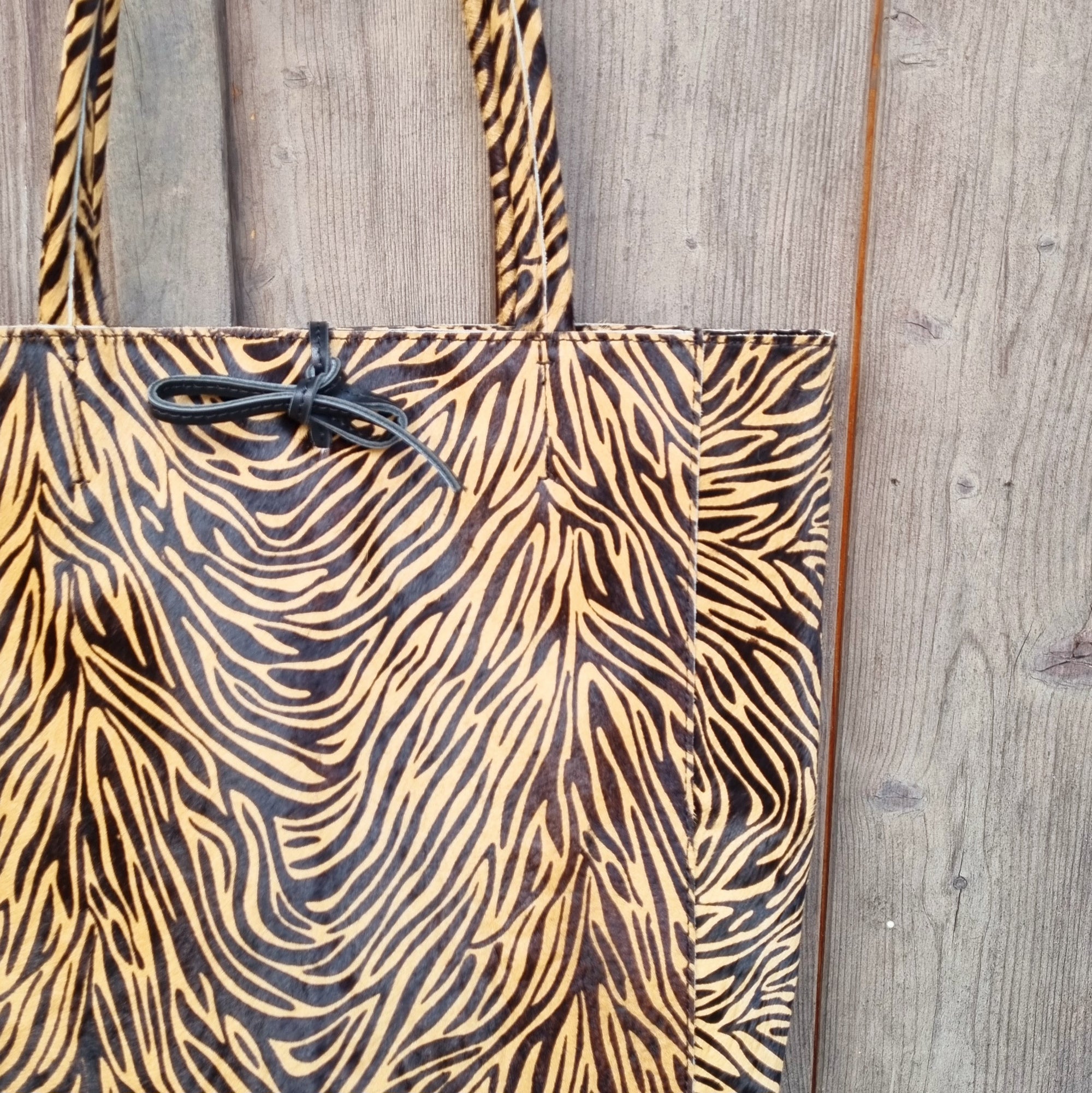 Yasmin zebra camel bag